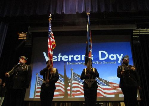 DPS students honor Veteran's Day with the U.S. flag. 