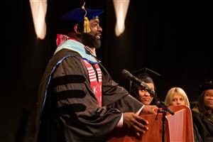 Principal Speaking at Graduation 